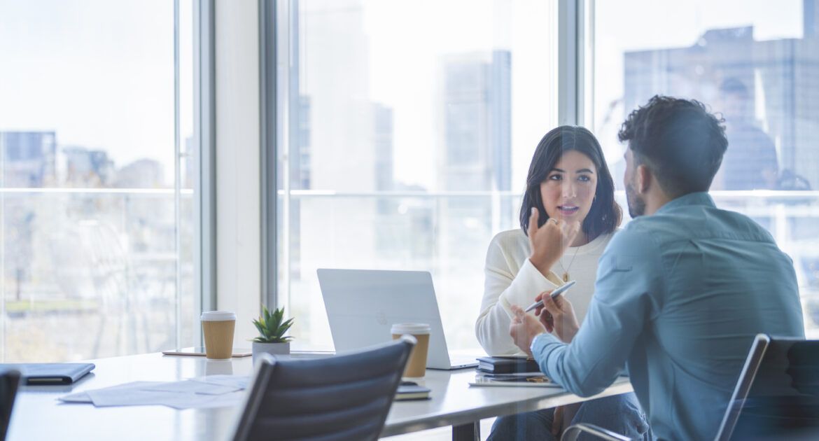 Man and woman conducting Exit interview