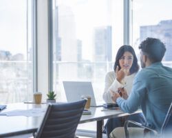 Man and woman conducting Exit interview