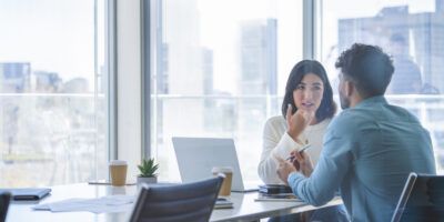 Man and woman conducting Exit interview