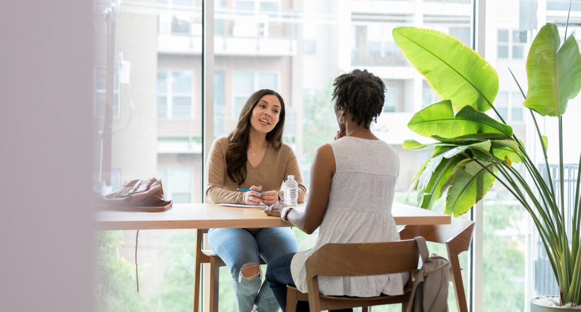 Financial advisor meets with her client