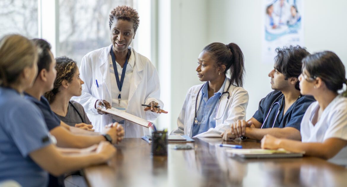 Female Doctor Teaching Nursing Students