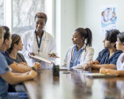 Female Doctor Teaching Nursing Students