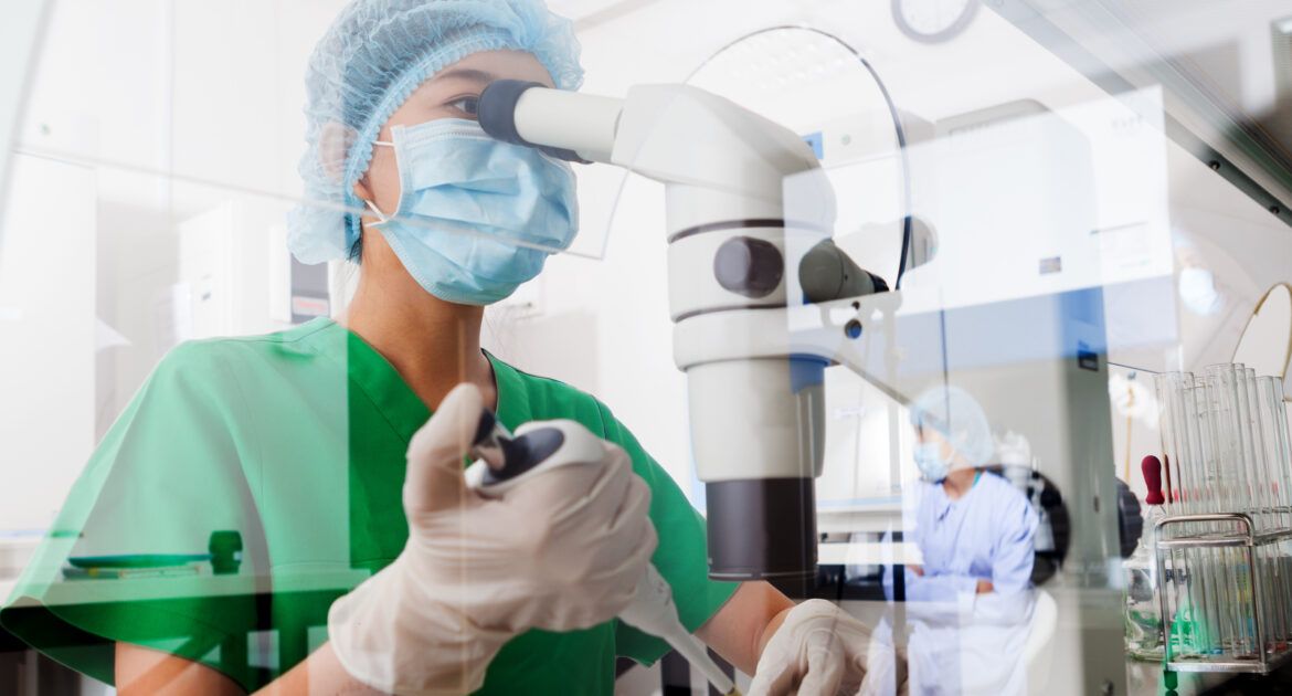 Molecular Geneticist conducting research in a lab