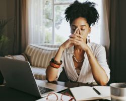 young woman stressed while working