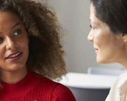 Woman asking key question when starting a new job